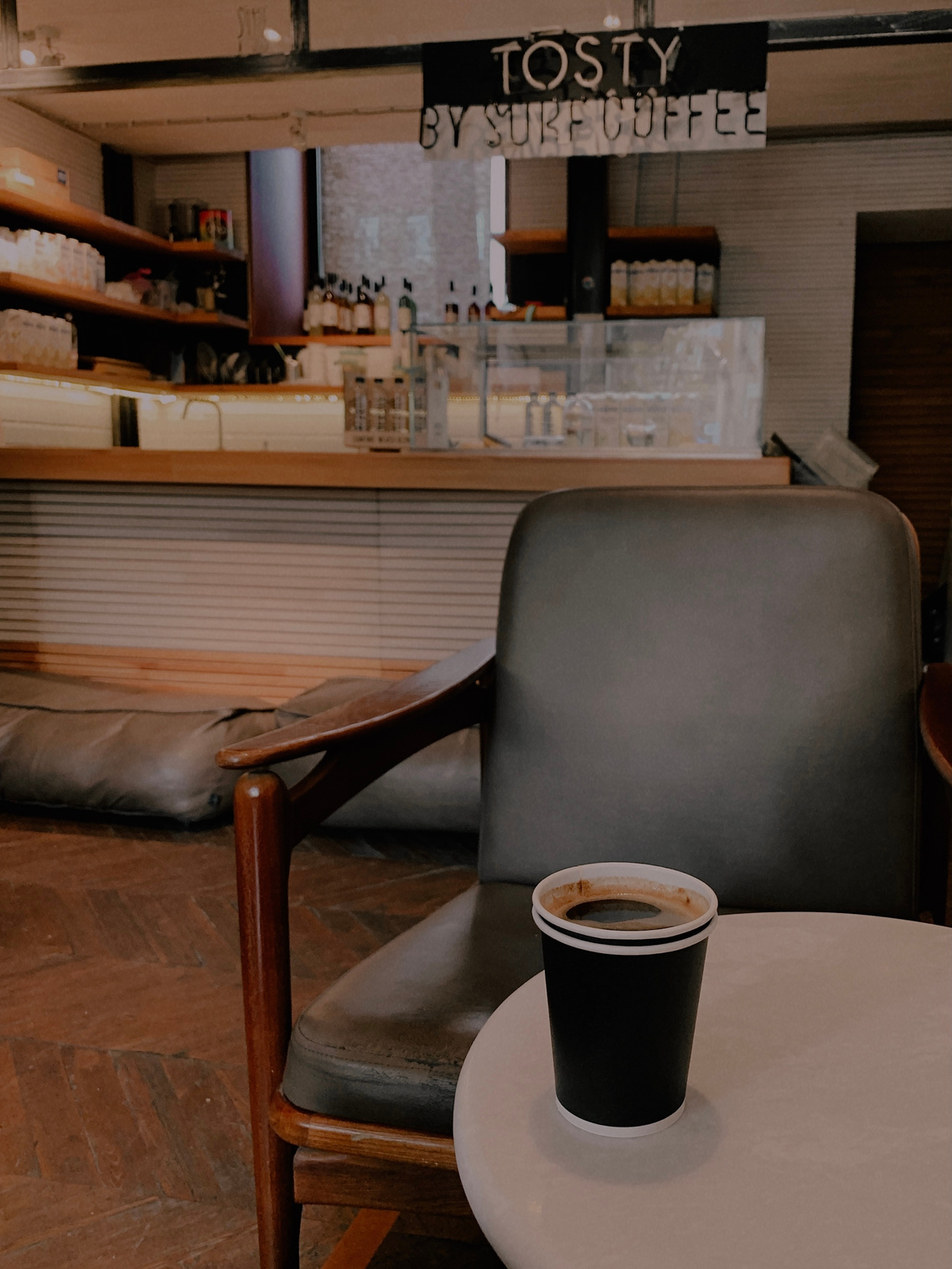 Black Paper Cup on the Table